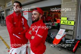 (L to R): Alexander Rossi (USA) Manor Marussia F1 Team with team mate Will Stevens (GBR) Manor Marussia F1 Team. 24.10.2015. Formula 1 World Championship, Rd 16, United States Grand Prix, Austin, Texas, USA, Qualifying Day.
