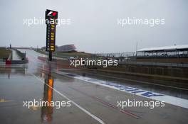 A wet and rainy pit lane. 24.10.2015. Formula 1 World Championship, Rd 16, United States Grand Prix, Austin, Texas, USA, Qualifying Day.
