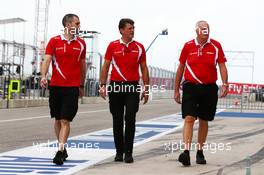 (L to R): Marc Hynes (GBR) Manor Marussia F1 Team Driver Coach with Graeme Lowdon (GBR) Manor Marussia F1 Team Chief Executive Officer and John Booth (GBR) Manor Marussia F1 Team Team Principal. 22.10.2015. Formula 1 World Championship, Rd 16, United States Grand Prix, Austin, Texas, USA, Preparation Day.