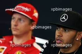 Lewis Hamilton (GBR) Mercedes AMG F1 and Kimi Raikkonen (FIN) Ferrari in the FIA Press Conference. 22.10.2015. Formula 1 World Championship, Rd 16, United States Grand Prix, Austin, Texas, USA, Preparation Day.