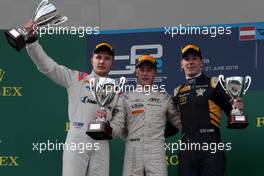 Race 1, 1st position Stoffel Vandoorne (BEL) Art Grand Prix , 2nd position Sergey Sirotkin (RUS) Rapax and 3rd position Alex Lynn (GBR) Dams 20.06.2015. GP2 Series, Rd 4, Spielberg, Austria, Saturday.