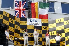 Podium: Race winner Marco Wittmann (GER) BMW Team RMG, BMW M4 DTM; second place Tom Blomqvist (GBR) BMW Team RBM, BMW M4 DTM; third place Jamie Green (GBR) Audi Sport Team Rosberg, Audi RS 5 DTM; Italian flag for Jamie Green (GBR) Audi Sport Team Rosberg, Audi RS 5 DTM. 10.09.2016, DTM Round 7, Nürburgring, Germany, Saturday Race.