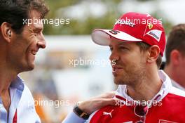 (L to R): Mark Webber (AUS) Porsche Team WEC Driver with Sebastian Vettel (GER) Ferrari. 18.03.2016. Formula 1 World Championship, Rd 1, Australian Grand Prix, Albert Park, Melbourne, Australia, Practice Day.