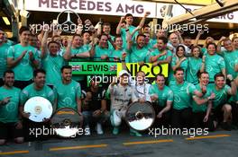 Lewis Hamilton (GBR) Mercedes Petronas AMG F1 and 1st place Nico Rosberg (GER) Mercedes Petronas AMG F1 celebrates with the team. 20.03.2016. Formula 1 World Championship, Rd 1, Australian Grand Prix, Albert Park, Melbourne, Australia, Race Day.