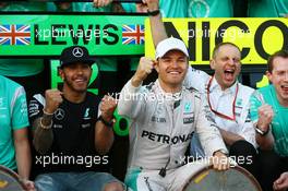 Lewis Hamilton (GBR) Mercedes Petronas AMG F1 and 1st place Nico Rosberg (GER) Mercedes Petronas AMG F1 celebrates with the team. 20.03.2016. Formula 1 World Championship, Rd 1, Australian Grand Prix, Albert Park, Melbourne, Australia, Race Day.