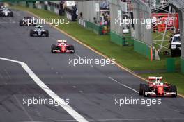 Sebastian Vettel (GER) Ferrari SF16-H leads the race. 20.03.2016. Formula 1 World Championship, Rd 1, Australian Grand Prix, Albert Park, Melbourne, Australia, Race Day.