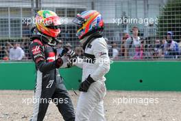 Esteban Gutierrez (MEX), Haas F1 Team and Fernando Alonso (ESP), McLaren Honda  20.03.2016. Formula 1 World Championship, Rd 1, Australian Grand Prix, Albert Park, Melbourne, Australia, Race Day.