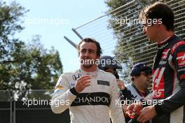 Fernando Alonso (ESP), McLaren Honda and Esteban Gutierrez (MEX), Haas F1 Team  20.03.2016. Formula 1 World Championship, Rd 1, Australian Grand Prix, Albert Park, Melbourne, Australia, Race Day.