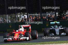 Sebastian Vettel (GER), Scuderia Ferrari and Nico Rosberg (GER), Mercedes AMG F1 Team  20.03.2016. Formula 1 World Championship, Rd 1, Australian Grand Prix, Albert Park, Melbourne, Australia, Race Day.