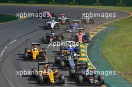 (L to R): Jolyon Palmer (GBR) Renault Sport F1 Team RS16 and Fernando Alonso (ESP) McLaren MP4-31 at the start of the race. 20.03.2016. Formula 1 World Championship, Rd 1, Australian Grand Prix, Albert Park, Melbourne, Australia, Race Day.