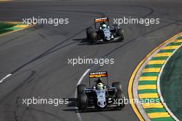 Sergio Perez (MEX) Sahara Force India F1 VJM09 and team mate Nico Hulkenberg (GER) Sahara Force India F1 VJM09. 20.03.2016. Formula 1 World Championship, Rd 1, Australian Grand Prix, Albert Park, Melbourne, Australia, Race Day.