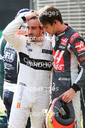 Esteban Gutierrez (MEX), Haas F1 Team and Fernando Alonso (ESP), McLaren Honda  20.03.2016. Formula 1 World Championship, Rd 1, Australian Grand Prix, Albert Park, Melbourne, Australia, Race Day.