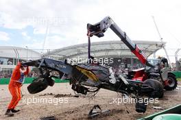 The McLaren MP4-31 of Fernando Alonso (ESP) McLaren is removed from the gravel trap after his race stopping crash. 20.03.2016. Formula 1 World Championship, Rd 1, Australian Grand Prix, Albert Park, Melbourne, Australia, Race Day.