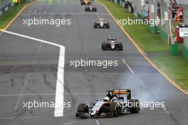 Nico Hulkenberg (GER) Sahara Force India F1 VJM09 locks up under braking. 20.03.2016. Formula 1 World Championship, Rd 1, Australian Grand Prix, Albert Park, Melbourne, Australia, Race Day.