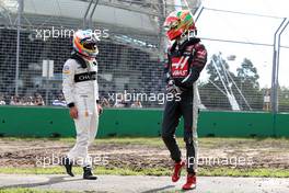 Fernando Alonso (ESP), McLaren Honda and Esteban Gutierrez (MEX), Haas F1 Team  20.03.2016. Formula 1 World Championship, Rd 1, Australian Grand Prix, Albert Park, Melbourne, Australia, Race Day.