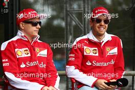 (L to R): Kimi Raikkonen (FIN) Ferrari with team mate Sebastian Vettel (GER) Ferrari. 19.03.2016. Formula 1 World Championship, Rd 1, Australian Grand Prix, Albert Park, Melbourne, Australia, Qualifying Day.