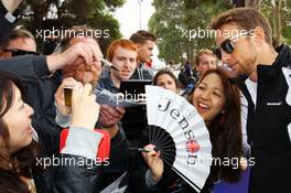 Jenson Button (GBR) McLaren with fans. 19.03.2016. Formula 1 World Championship, Rd 1, Australian Grand Prix, Albert Park, Melbourne, Australia, Qualifying Day.