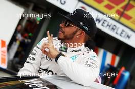 Lewis Hamilton (GBR) Mercedes AMG F1 celebrates his pole position. 19.03.2016. Formula 1 World Championship, Rd 1, Australian Grand Prix, Albert Park, Melbourne, Australia, Qualifying Day.