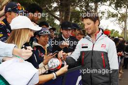 Romain Grosjean (FRA) Haas F1 Team signs autographs for the fans. 19.03.2016. Formula 1 World Championship, Rd 1, Australian Grand Prix, Albert Park, Melbourne, Australia, Qualifying Day.