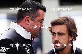 (L to R): Eric Boullier (FRA) McLaren Racing Director with Fernando Alonso (ESP) McLaren. 19.03.2016. Formula 1 World Championship, Rd 1, Australian Grand Prix, Albert Park, Melbourne, Australia, Qualifying Day.