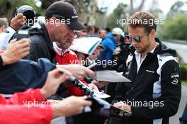 Jenson Button (GBR) McLaren signs autographs for the fans. 19.03.2016. Formula 1 World Championship, Rd 1, Australian Grand Prix, Albert Park, Melbourne, Australia, Qualifying Day.