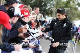 Esteban Ocon (FRA) Renault Sport F1 Team Test Driver signs autographs for the fans. 19.03.2016. Formula 1 World Championship, Rd 1, Australian Grand Prix, Albert Park, Melbourne, Australia, Qualifying Day.