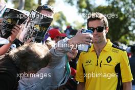 Jolyon Palmer (GBR) Renault Sport F1 Team signs autographs for the fans. 20.03.2016. Formula 1 World Championship, Rd 1, Australian Grand Prix, Albert Park, Melbourne, Australia, Race Day.