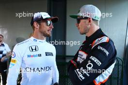 (L to R): Jenson Button (GBR) McLaren with Nico Hulkenberg (GER) Sahara Force India F1. 20.03.2016. Formula 1 World Championship, Rd 1, Australian Grand Prix, Albert Park, Melbourne, Australia, Race Day.