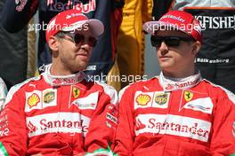 Sebastian Vettel (GER), Scuderia Ferrari and Kimi Raikkonen (FIN), Scuderia Ferrari  20.03.2016. Formula 1 World Championship, Rd 1, Australian Grand Prix, Albert Park, Melbourne, Australia, Race Day.