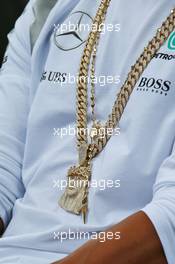 Lewis Hamilton (GBR) Mercedes AMG F1 - necklace. 17.03.2016. Formula 1 World Championship, Rd 1, Australian Grand Prix, Albert Park, Melbourne, Australia, Preparation Day.