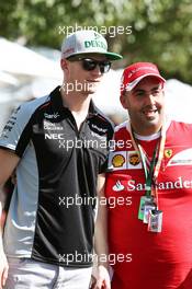 Nico Hulkenberg (GER) Sahara Force India F1 with a fan. 17.03.2016. Formula 1 World Championship, Rd 1, Australian Grand Prix, Albert Park, Melbourne, Australia, Preparation Day.