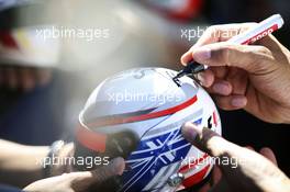 A miniature helmet is signed. 17.03.2016. Formula 1 World Championship, Rd 1, Australian Grand Prix, Albert Park, Melbourne, Australia, Preparation Day.