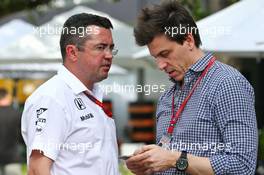 (L to R): Eric Boullier (FRA) McLaren Racing Director with Toto Wolff (GER) Mercedes AMG F1 Shareholder and Executive Director. 17.03.2016. Formula 1 World Championship, Rd 1, Australian Grand Prix, Albert Park, Melbourne, Australia, Preparation Day.
