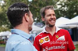 (L to R): Christian Horner (GBR) Red Bull Racing Team Principal with Sebastian Vettel (GER) Ferrari. 17.03.2016. Formula 1 World Championship, Rd 1, Australian Grand Prix, Albert Park, Melbourne, Australia, Preparation Day.