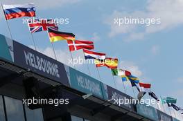 Flags over the pit lane. 16.03.2016. Formula 1 World Championship, Rd 1, Australian Grand Prix, Albert Park, Melbourne, Australia, Preparation Day.