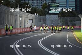 Highly visible people walk the circuit. 16.03.2016. Formula 1 World Championship, Rd 1, Australian Grand Prix, Albert Park, Melbourne, Australia, Preparation Day.