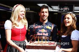 Daniel Ricciardo (AUS) Red Bull Racing celebrates his birthday with a cake. 01.07.2016. Formula 1 World Championship, Rd 9, Austrian Grand Prix, Spielberg, Austria, Practice Day.