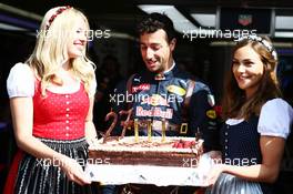 Daniel Ricciardo (AUS) Red Bull Racing celebrates his birthday with a cake. 01.07.2016. Formula 1 World Championship, Rd 9, Austrian Grand Prix, Spielberg, Austria, Practice Day.