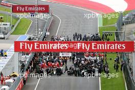 Lewis Hamilton (GBR) Mercedes AMG F1 W07 Hybrid and Nico Hulkenberg (GER) Sahara Force India F1 VJM09 on the front row of the grid before the start of the race. 03.07.2016. Formula 1 World Championship, Rd 9, Austrian Grand Prix, Spielberg, Austria, Race Day.