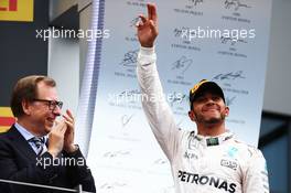 Race winner Lewis Hamilton (GBR) Mercedes AMG F1 celebrates on the podium. 03.07.2016. Formula 1 World Championship, Rd 9, Austrian Grand Prix, Spielberg, Austria, Race Day.