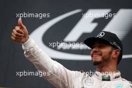 Race winner Lewis Hamilton (GBR) Mercedes AMG F1 celebrates on the podium. 03.07.2016. Formula 1 World Championship, Rd 9, Austrian Grand Prix, Spielberg, Austria, Race Day.