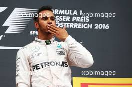 Race winner Lewis Hamilton (GBR) Mercedes AMG F1 celebrates on the podium. 03.07.2016. Formula 1 World Championship, Rd 9, Austrian Grand Prix, Spielberg, Austria, Race Day.