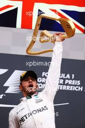Race winner Lewis Hamilton (GBR) Mercedes AMG F1 celebrates on the podium. 03.07.2016. Formula 1 World Championship, Rd 9, Austrian Grand Prix, Spielberg, Austria, Race Day.