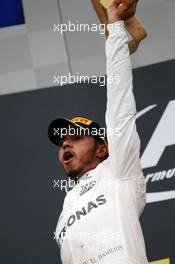 Race winner Lewis Hamilton (GBR) Mercedes AMG F1 celebrates on the podium. 03.07.2016. Formula 1 World Championship, Rd 9, Austrian Grand Prix, Spielberg, Austria, Race Day.