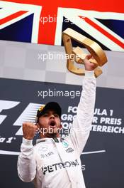 Race winner Lewis Hamilton (GBR) Mercedes AMG F1 celebrates on the podium. 03.07.2016. Formula 1 World Championship, Rd 9, Austrian Grand Prix, Spielberg, Austria, Race Day.