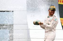 Race winner Lewis Hamilton (GBR) Mercedes AMG F1 celebrates on the podium. 03.07.2016. Formula 1 World Championship, Rd 9, Austrian Grand Prix, Spielberg, Austria, Race Day.