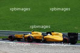 Jolyon Palmer (GBR) Renault Sport F1 Team RS16 and team mate Kevin Magnussen (DEN) Renault Sport F1 Team RS16 at the start of the race. 03.07.2016. Formula 1 World Championship, Rd 9, Austrian Grand Prix, Spielberg, Austria, Race Day.