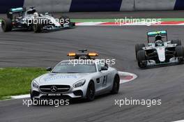 Nico Rosberg (GER) Mercedes AMG F1 W07 Hybrid leads behind the FIA Safety Car. 03.07.2016. Formula 1 World Championship, Rd 9, Austrian Grand Prix, Spielberg, Austria, Race Day.