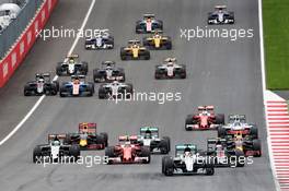 Lewis Hamilton (GBR) Mercedes AMG F1 W07 Hybrid leads at the start of the race. 03.07.2016. Formula 1 World Championship, Rd 9, Austrian Grand Prix, Spielberg, Austria, Race Day.