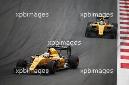 Kevin Magnussen (DEN) Renault Sport F1 Team RS16 leads team mate Jolyon Palmer (GBR) Renault Sport F1 Team RS16. 03.07.2016. Formula 1 World Championship, Rd 9, Austrian Grand Prix, Spielberg, Austria, Race Day.